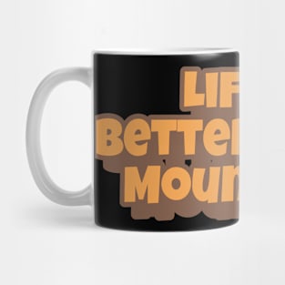 Life Is Better In The Mountains Big Playfull Font Design with Orange and Brown Mug